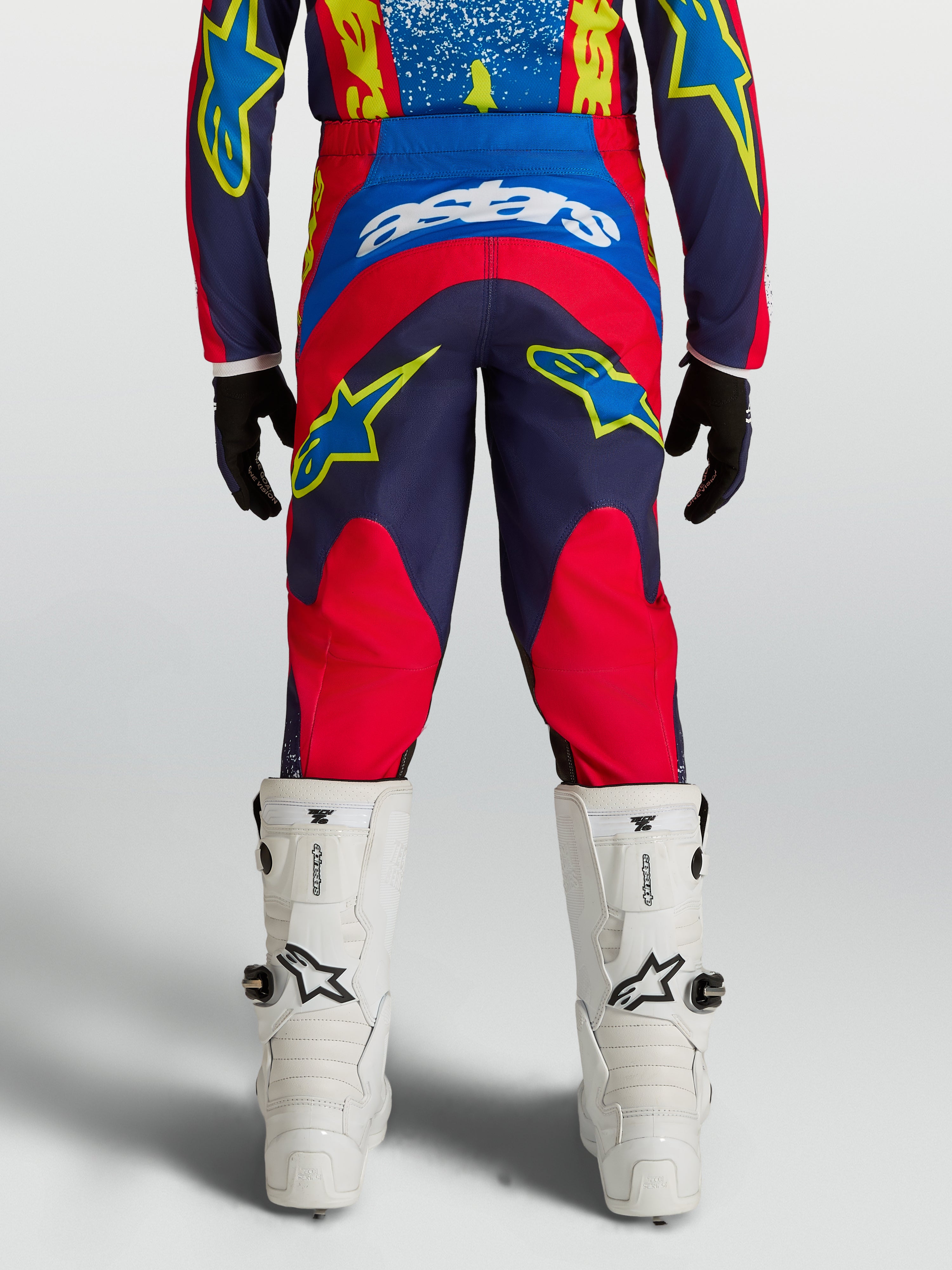 Alpinestars Jugend Fluid Drag Hose 2027, Motocross-Hose in Blau und Rot, Rückansicht, strapazierfähiges 600D-Polygewebe.