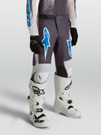 Alpinestars Fluid Drag Jugend-Hose 2027, Motocross-Hose in Grau und Blau aus strapazierfähigem 600D-Polygewebe.