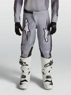Alpinestars Fluid Jugend-Hose Amber, Motocross-Hose für junge Offroad-Fahrer, Grau und Schwarz, aus robustem 600D-Polygewebe.
