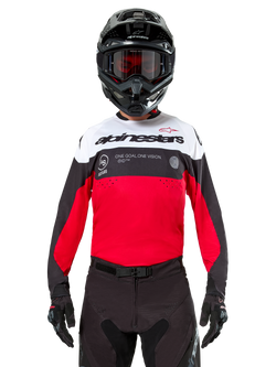 Alpinestars Pro-Dura Jersey, Motocross Jersey, Black Bright Red and White, worn with black helmet and goggles, sporty design with bold Alpinestars branding and laser perforations, performance enduro and off-road racing gear