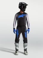 Alpinestars Supertech Hiten AFD Trikot und Gear Set, Herren-Motocross-Ausrüstung in Schwarz-Blau, ergonomische Passform.
