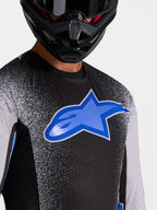 Alpinestars Supertech Hiten AFD Trikot, Herren-Motocross-Renntrikot, Schwarz-Blau, mit lasergefertigten Belüftungsöffnungen.