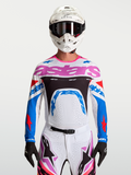 Alpinestars Supertech Dyna Trikot, weiß-blaues Herren-Motocross-Oberteil mit Pink, aus atmungsaktivem Stretch-Mesh.