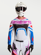 Alpinestars Supertech Dyna Trikot, weiß-blaues Herren-Motocross-Oberteil mit Pink, aus atmungsaktivem Stretch-Mesh.