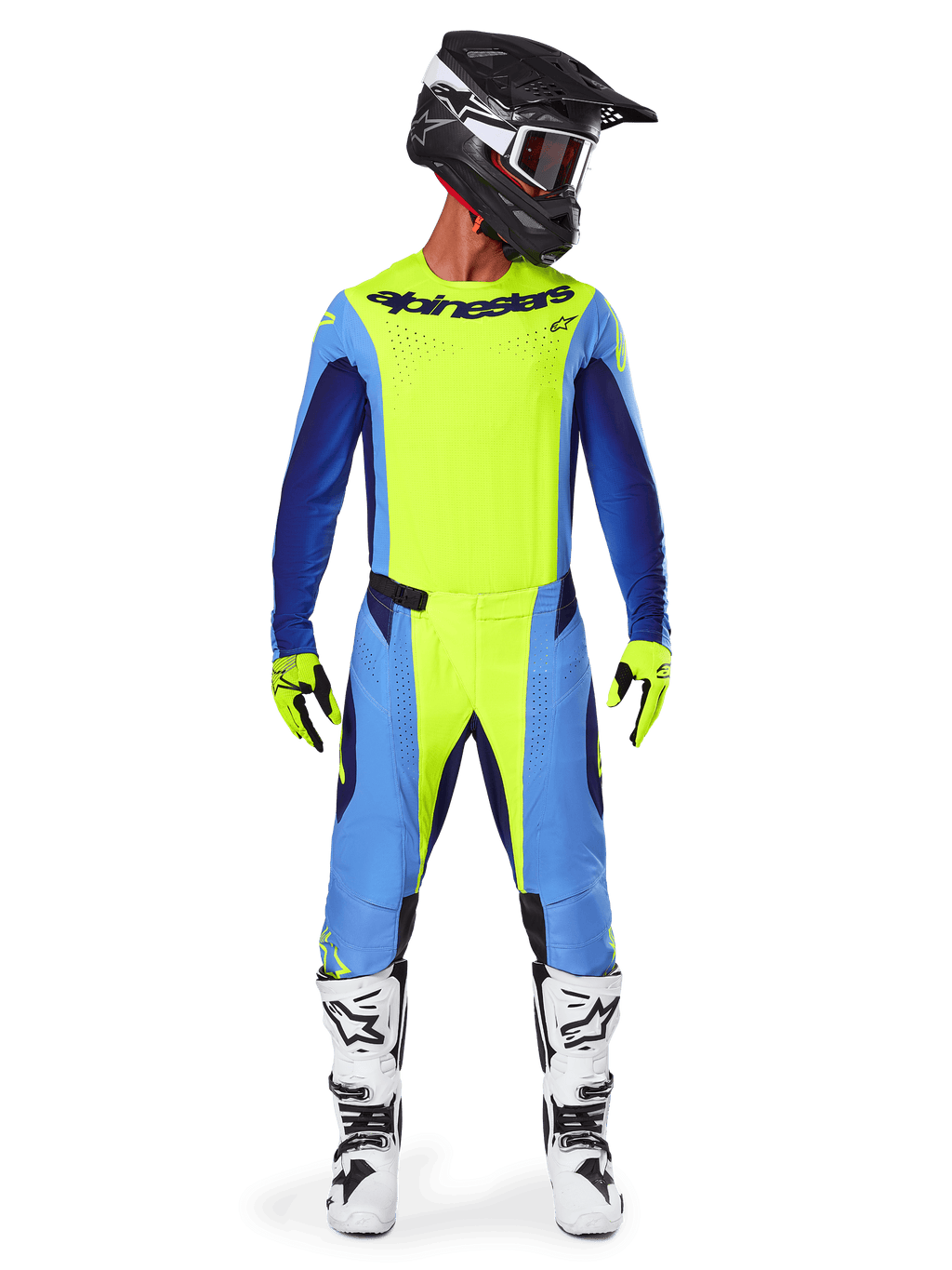 Motocross-Fahrer in kompletter Rennausrüstung, Alpinestars 2025 Techstar Melt Trikot in Gelb Fluo und Blau, passende gelbe und blaue Motocross-Hose, schwarzer Helm mit weißen Grafiken und Schutzbrille, weiße und schwarze Stiefel, gelbe und schwarze Handschuhe, abgestimmtes Performance-Outfit für Offroad-Rennen