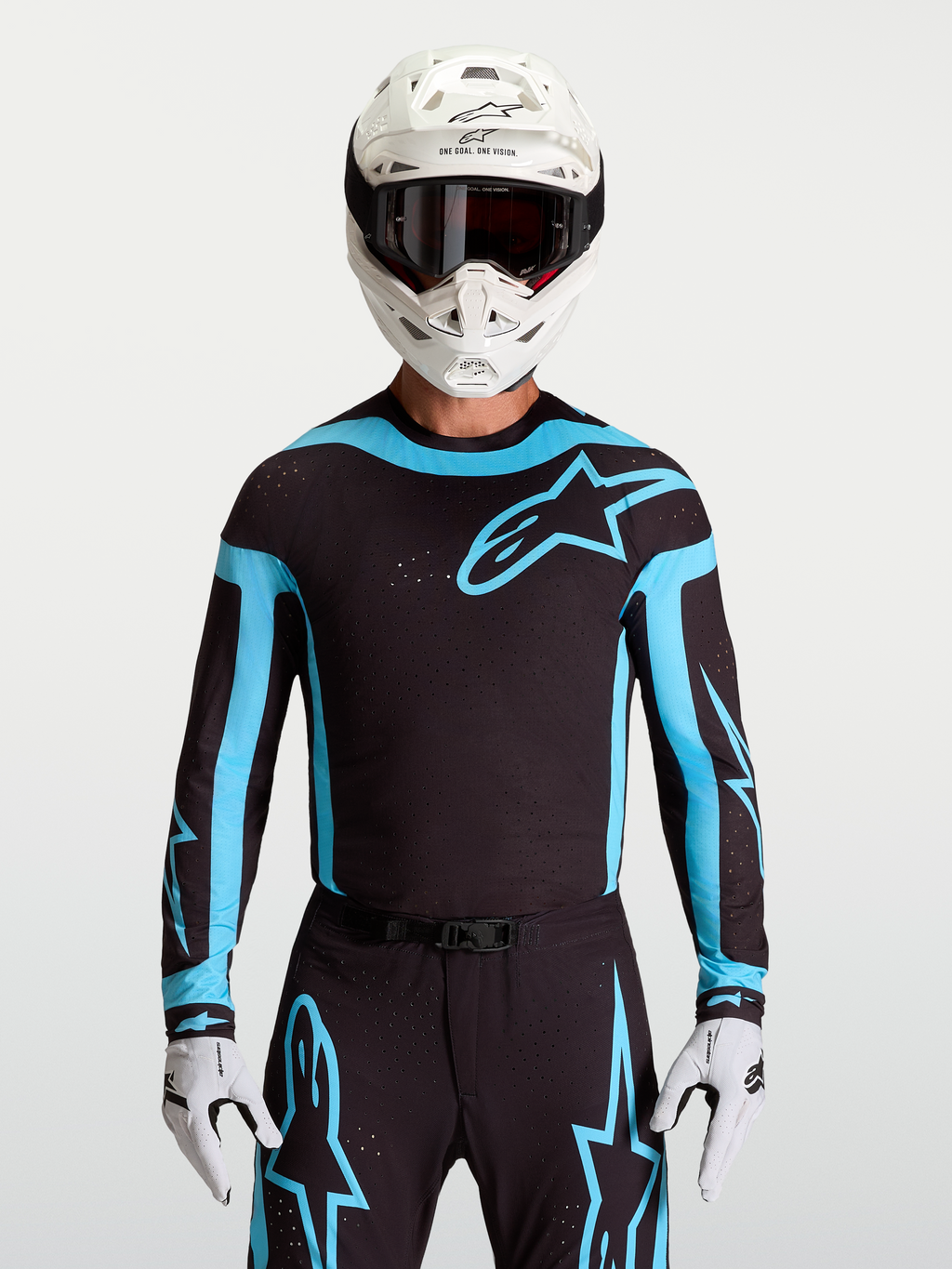Alpinestars Supertech Vesta Trikot, Motocross-Oberteil für Herren, Schwarz und Türkis, atmungsaktiv mit Laser-Perforationen.