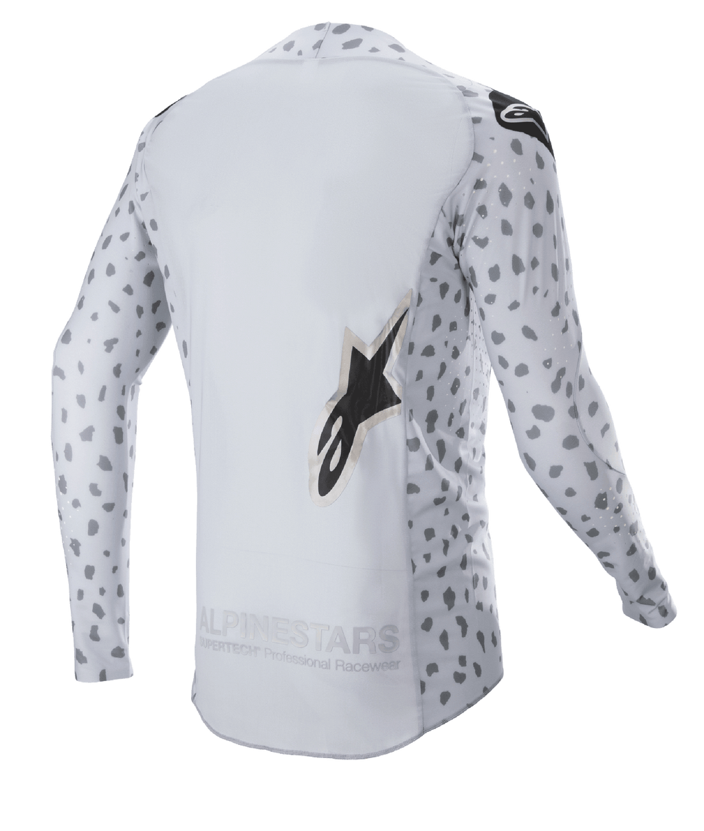 Alpinestars 2023 Supertech North Jersey, Motocross Jersey, Haze Gray and Black, back view featuring an abstract spotted pattern on sleeves and sides, large star logo, extended back panel, and breathable performance construction