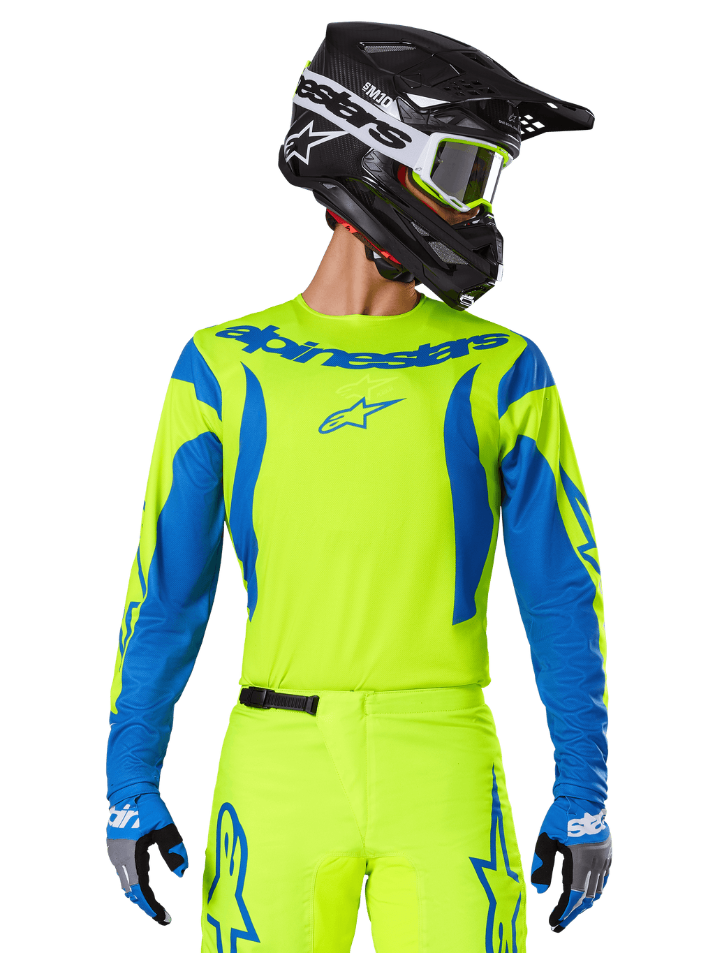 Alpinestars 2025 Fluid Haul Jersey, Motocross-Trikot, Neongelb und Blau, mit blauem Alpinestars-Branding auf der Brust, getragen mit passender Ausrüstung einschließlich eines schwarzen Helms und blauer Handschuhe, sportliche Passform für das Offroad-Fahren