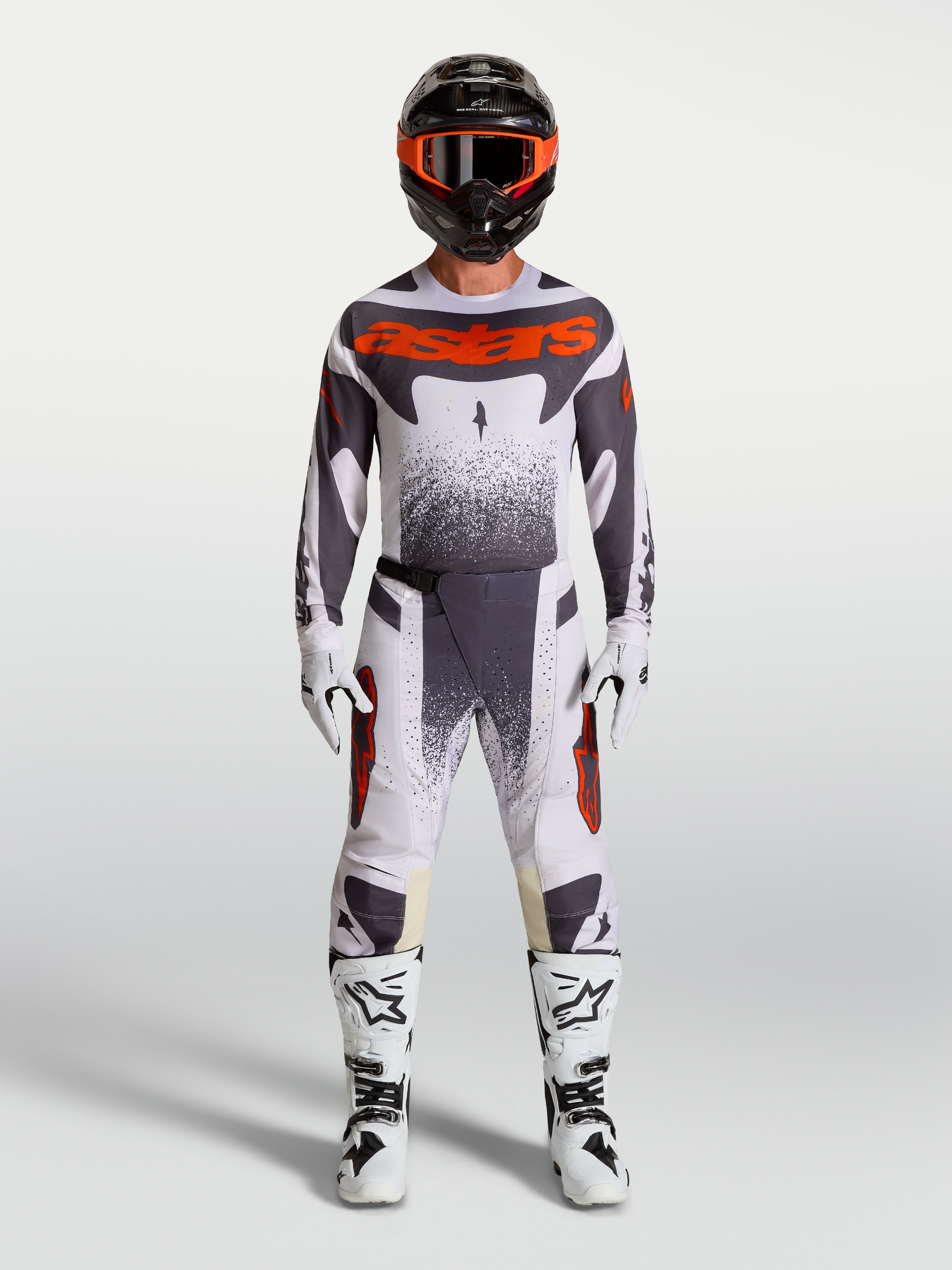 Alpinestars Techstar Swan Gear Set in Grau und Fluo-Rot, Motocross-Bekleidungsset aus Trikot und Hose für Performance-Riding.