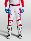 Alpinestars Racer Hunt Pants, performance motocross racing pants in white, fire red, and blue with ergonomic pre-curved legs and leather knee panels.