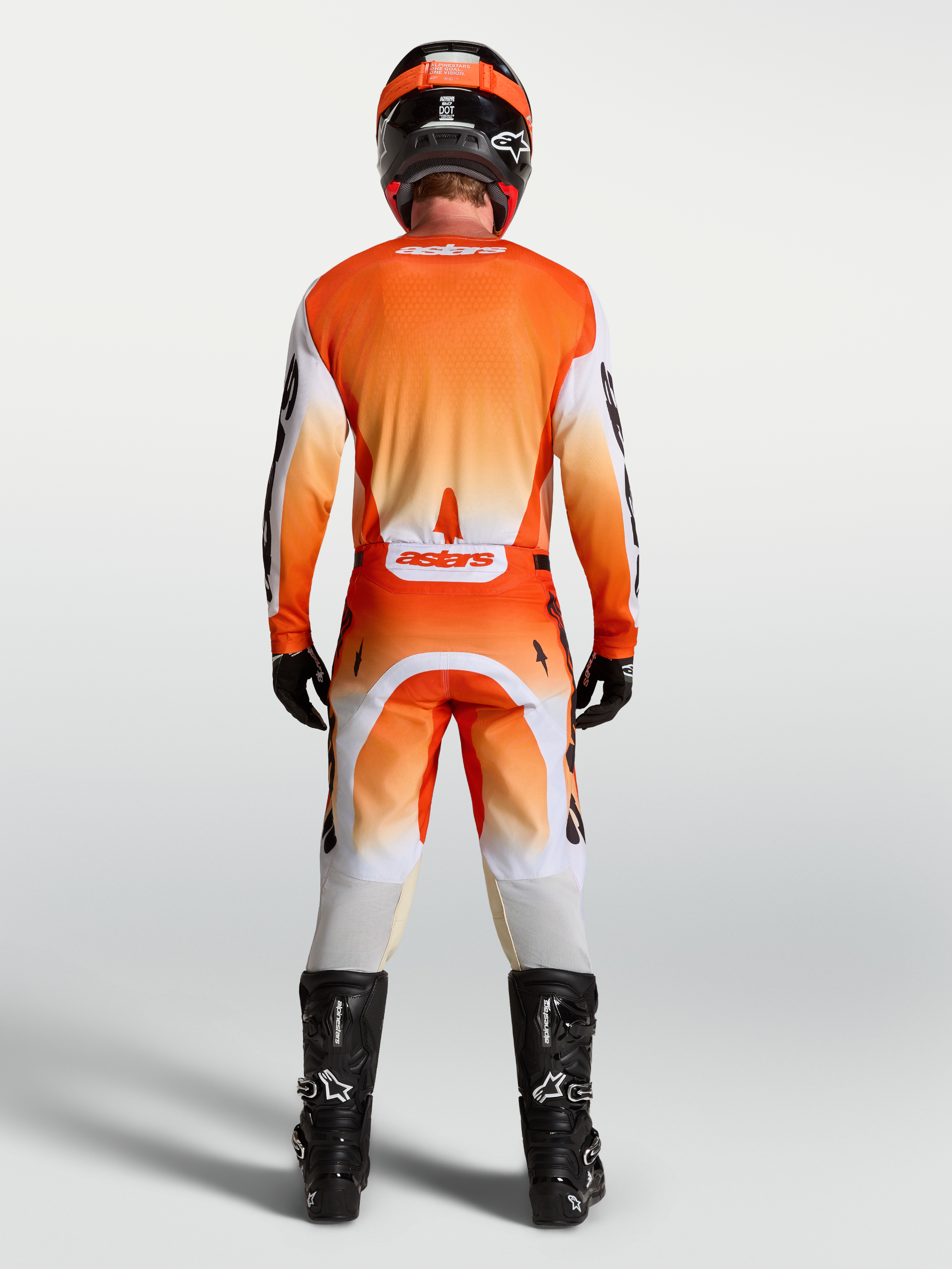 Alpinestars Racer Amber Hose AND Racer Amber Gear Set, Herren-Motocross-Outfit, Orange und Weiß, Rückansicht.
