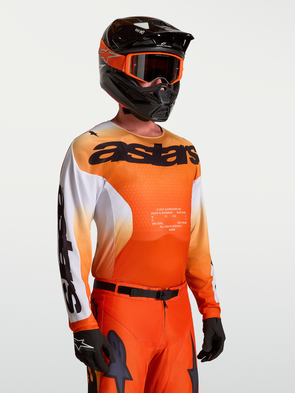 Alpinestars Racer Amber Trikot, Herren-Motocross-Trikot, Orange und Weiß, leichtes Polygewebe mit ergonomischer Rennpassform.