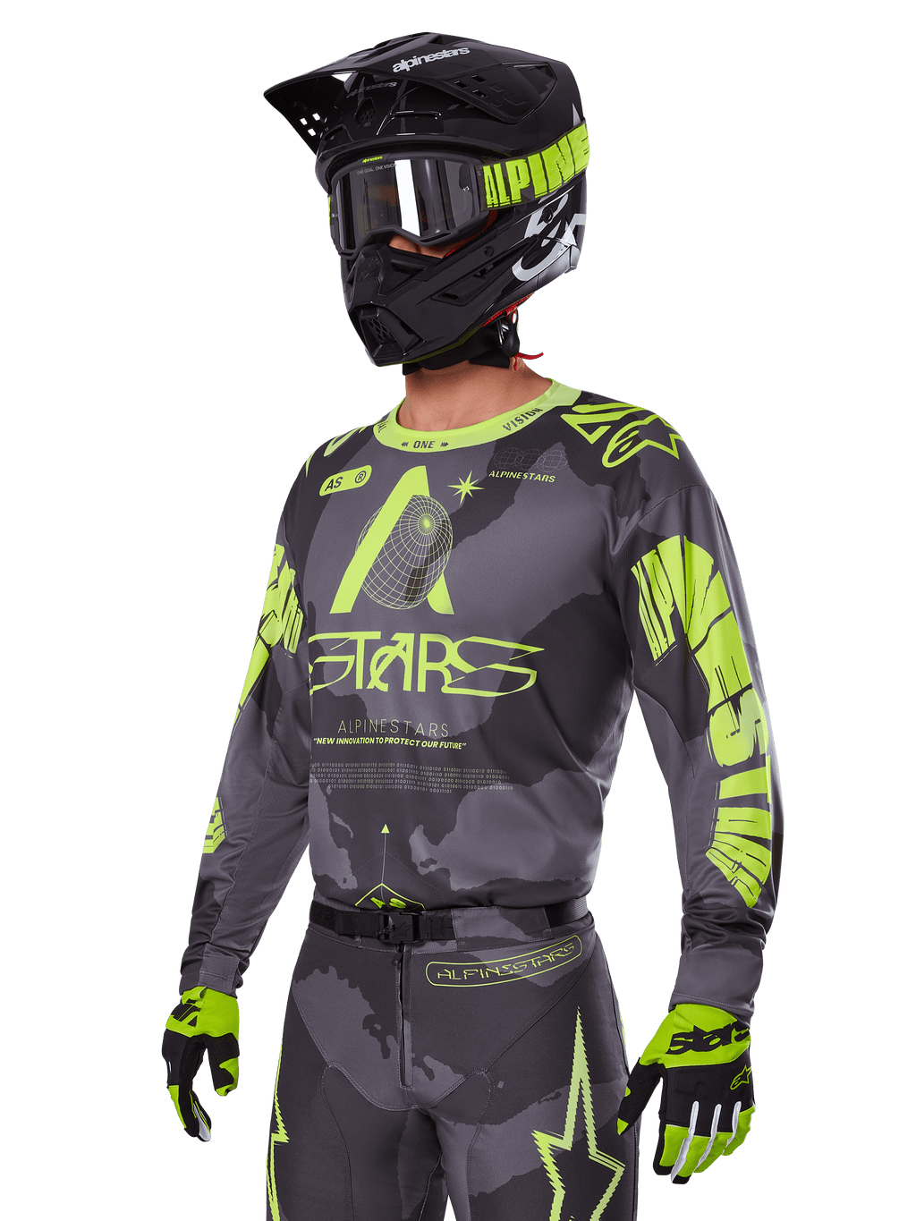 Alpinestars 2025 Racer Hollow Ausrüstungsset, Motocross-Jersey und -Hose in Grau und Neongelb, getragen mit passendem schwarzem Helm, Goggles und Handschuhen, mit markantem fluoreszierend gelbem Alpinestars-Branding und Stern-Grafiken auf einer gemusterten grauen Basis, koordinierter professioneller Offroad-Rennlook