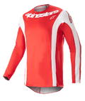 Alpinestars 2023 Techstar Arch Jersey, Motocross-Trikot, Mars-Rot und Weiß, weißer Alpinestars-Schriftzug auf der Brust, perforiertes Funktionsgewebe, lange Ärmel mit weißen Akzenten, sportliches Design für Offroad-Rennsport