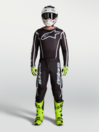 Alpinestars Fluid Apex V2 Trikot und Gear Set, Herren-Motocross-Ausrüstung in Schwarz, Silber und Fluo-Gelb.