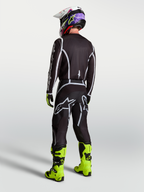 Alpinestars Fluid Apex V2 Trikot für Herren, Motocross-Trikot in Schwarz und Silber, Rückansicht mit sportlicher Passform.