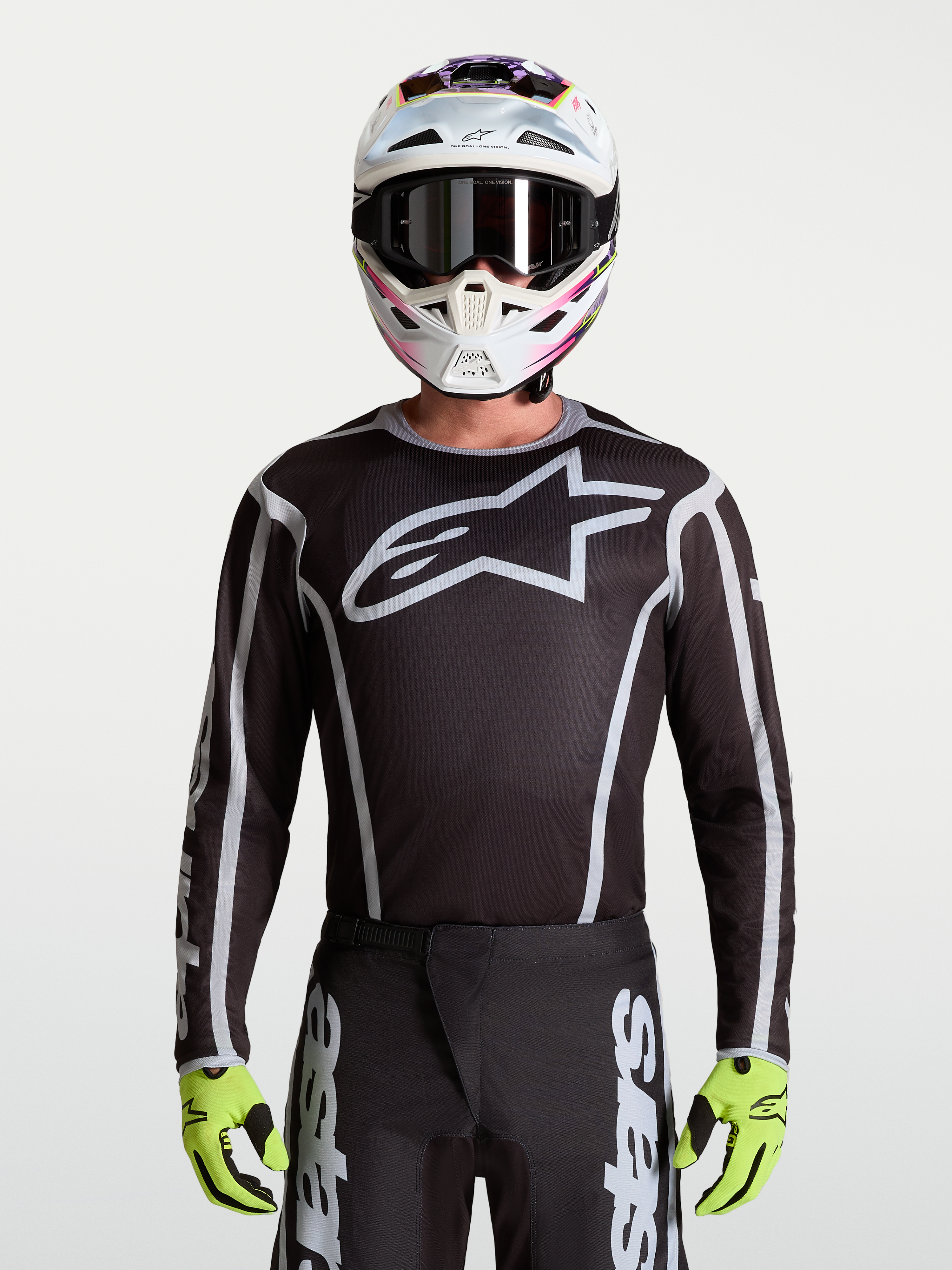 Alpinestars Fluid Apex V2 Trikot, Herren-Motocross-Trikot, Schwarz und Silber, großes Stern-Logo, sportliche Passform.