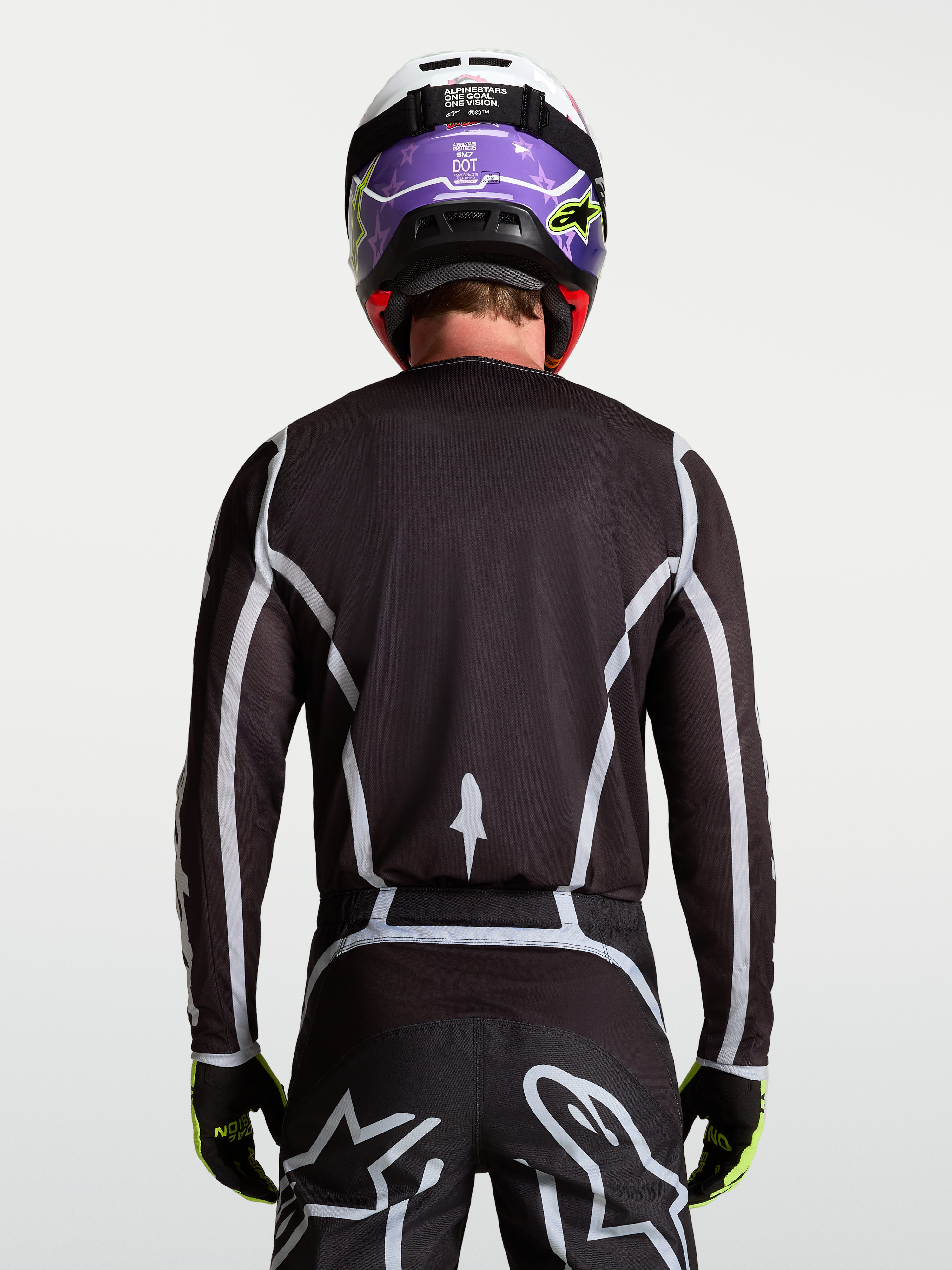 Alpinestars Fluid Apex V2 Trikot, Herren-Motocross-Trikot, Schwarz und Silber, R%fcckansicht mit ergonomischer Passform.