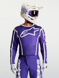 Fluid Apex V2 Jersey, on-model motocross jersey in Deep Blue and White, featuring moisture-wicking polyfabric and ergonomic athletic fit.