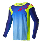 Alpinestars 2024 Racer Hoen Trikot, Motocross-Trikot, Gelb Fluo und Blau Night Navy, blauer Farbverlauf mit fluoreszierend gelben Einsätzen, rotes Alpinestars-Logo auf Brust und Schultern, langärmelige technische Offroad-Ausrüstung.