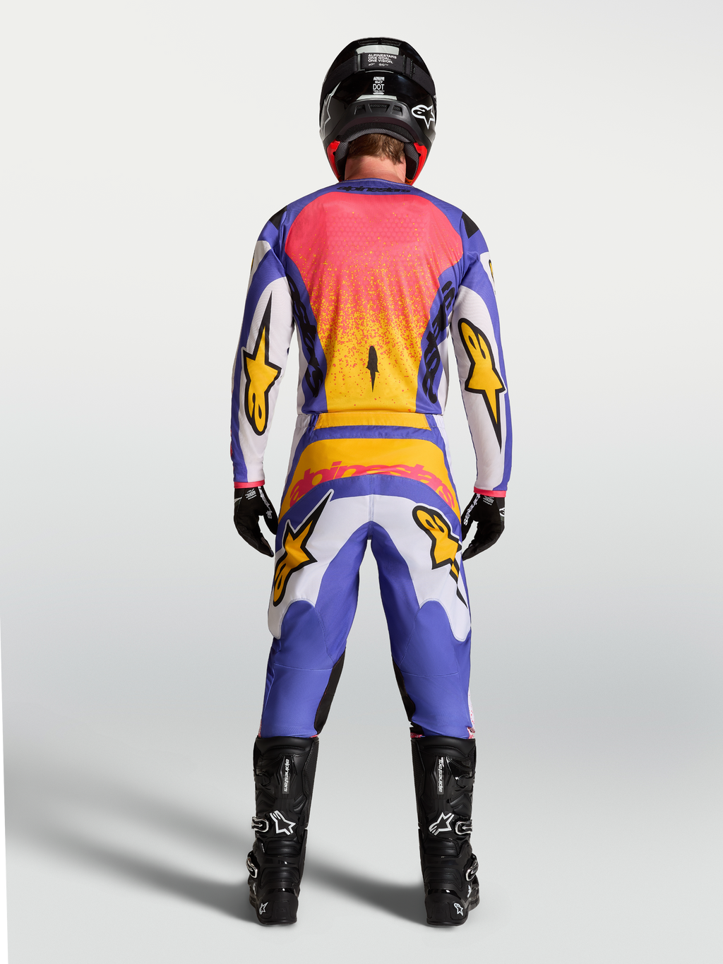 Alpinestars Fluid Drag Trikot, Herren-Motocross-Trikot, Blau, Lila und Gold, Rückansicht am Model.
