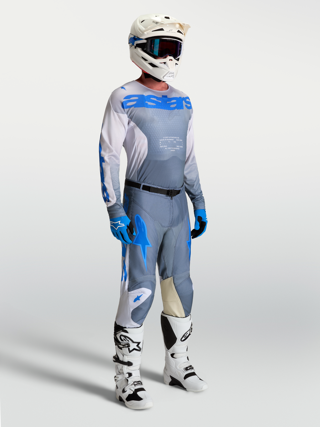 Alpinestars Racer Amber Gear Set und Hose, Herren-Motocross-Outfit in Aschgrau und UCLA-Blau mit sportlicher Rennpassform.
