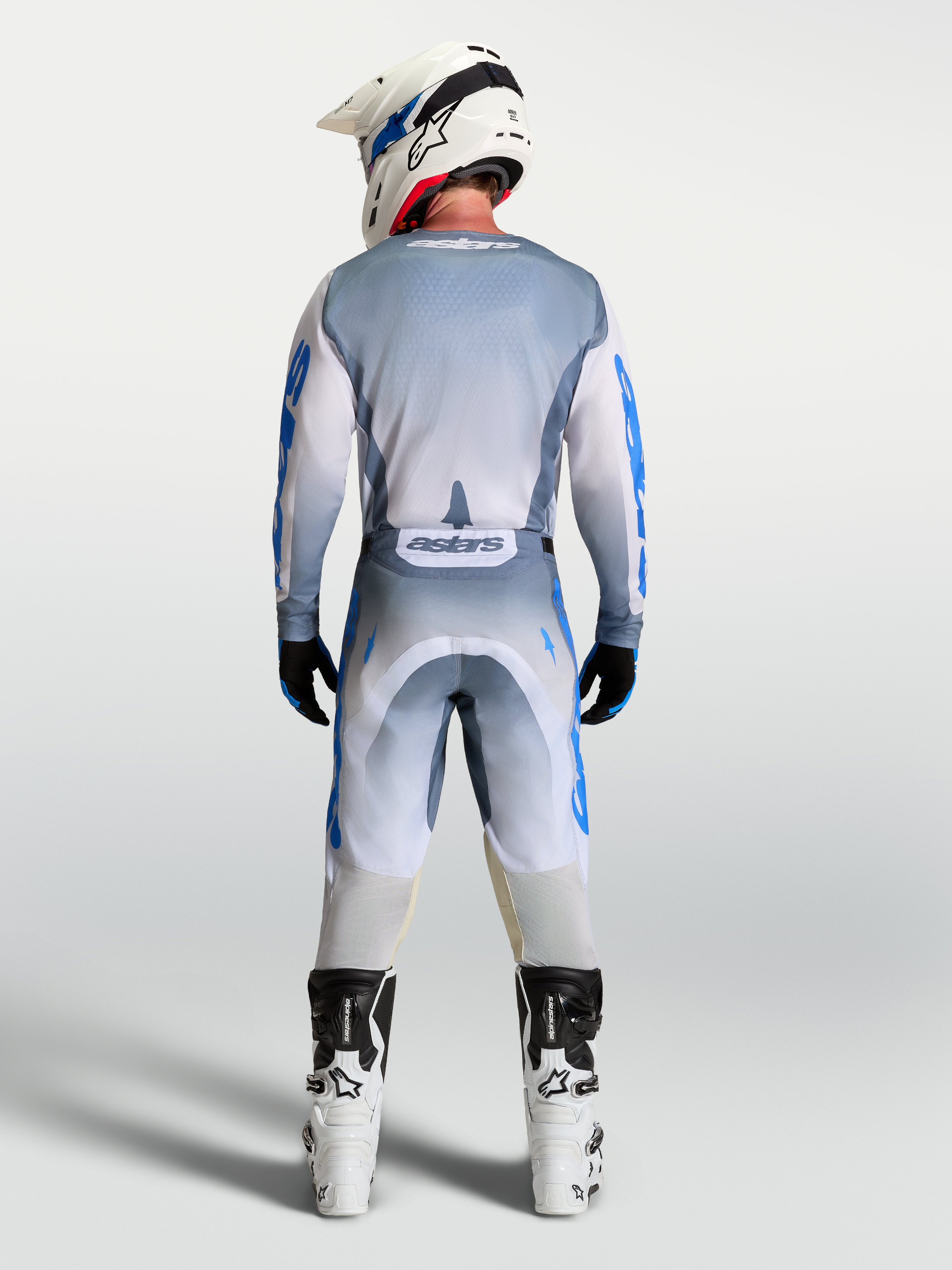 Alpinestars Racer Amber Hose und Gear Set, Herren-Motocross-Outfit in Aschgrau und UCLA-Blau, Rückansicht.