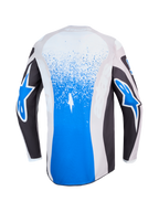Alpinestars Fluid Drag Trikot, blaues und graues Motocross-Trikot, Rückansicht mit Splatter-Grafiken und Stern-Logos.