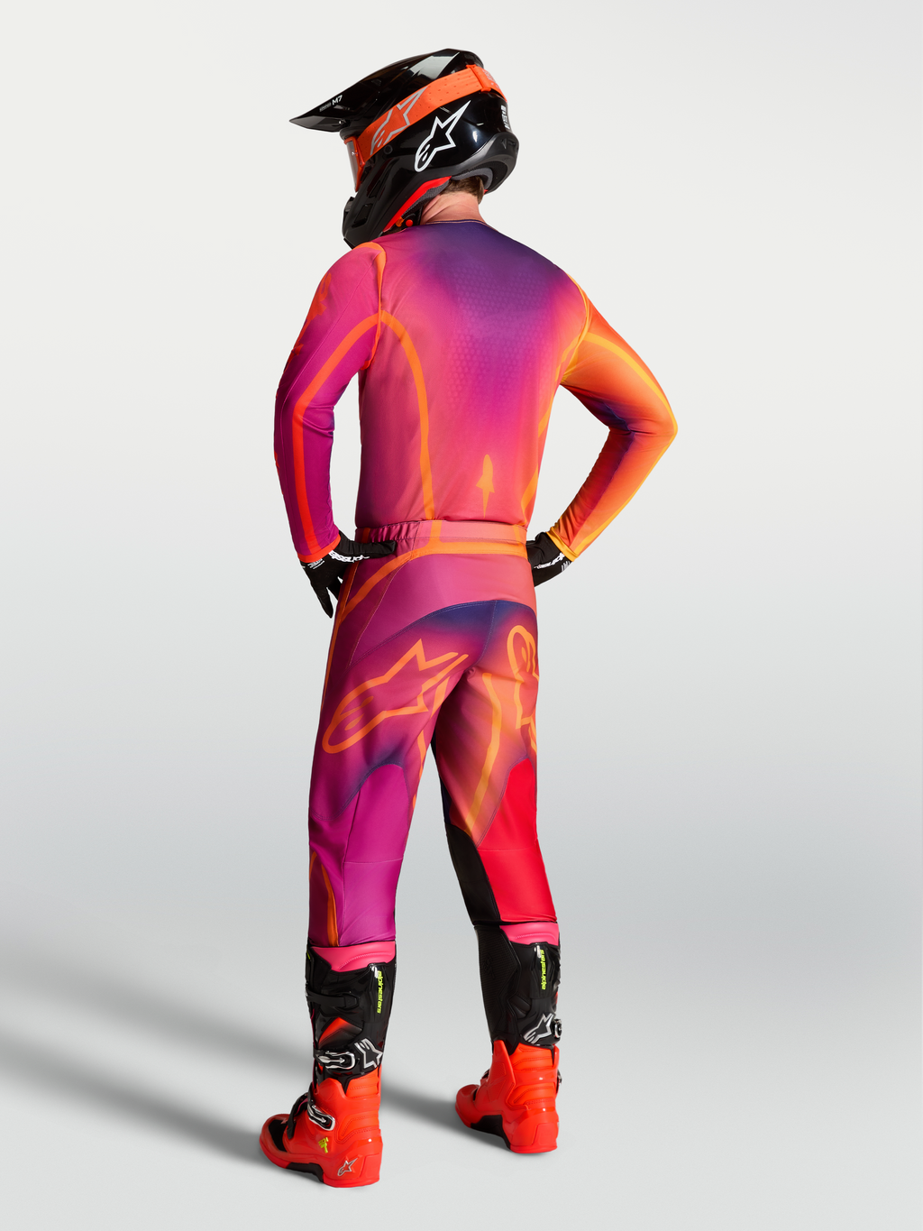 Alpinestars Fluid Kepler Hose, Motocross-Hose für Herren, Lila und Orange, Rückansicht mit ergonomischer Sport-Passform.