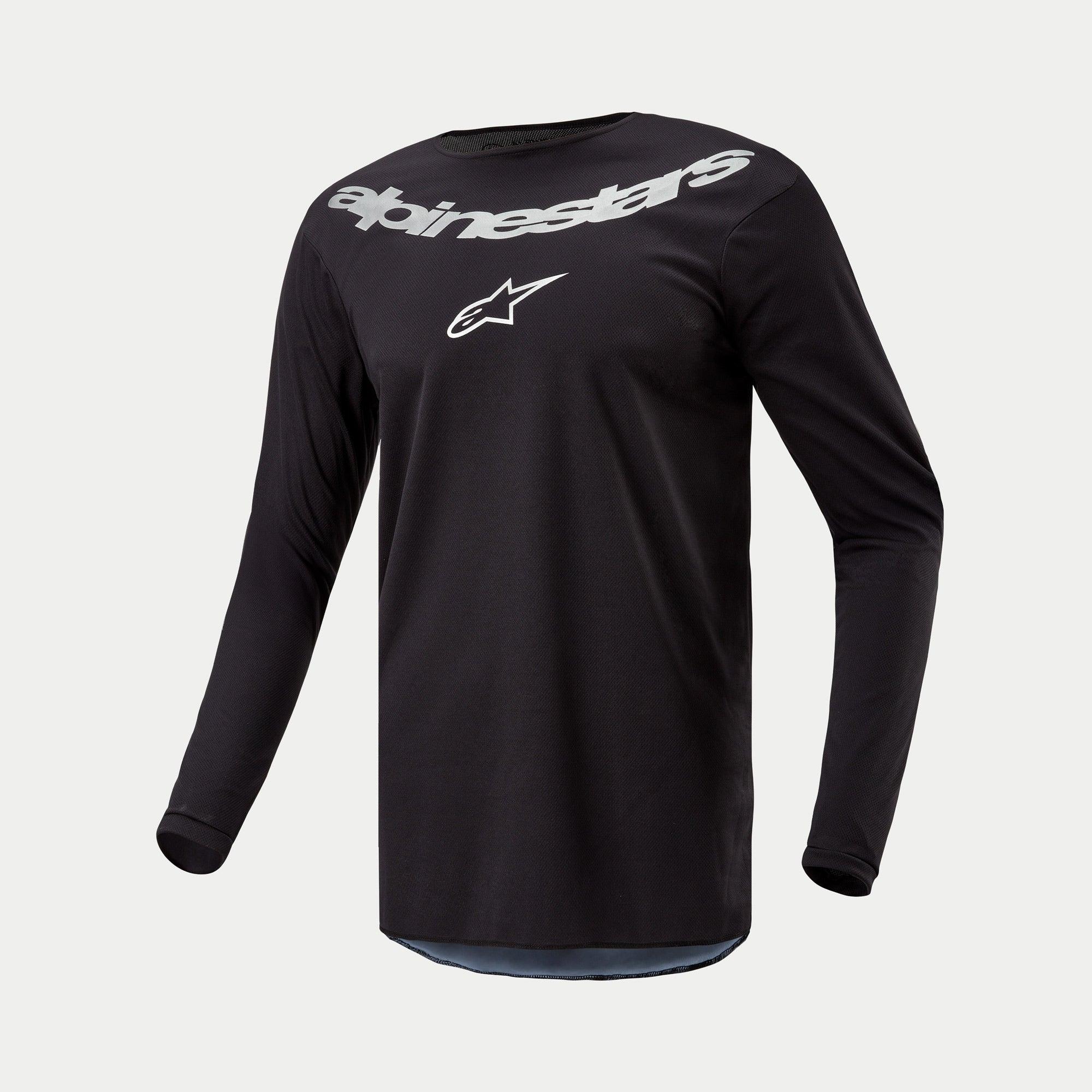 Alpinestars 2024 Fluid Graphite Jersey, Motocross Jersey, Black Silver, long-sleeve performance top featuring large silver Alpinestars branding and star logo on chest, lightweight moisture-wicking poly-fabric for off-road riding