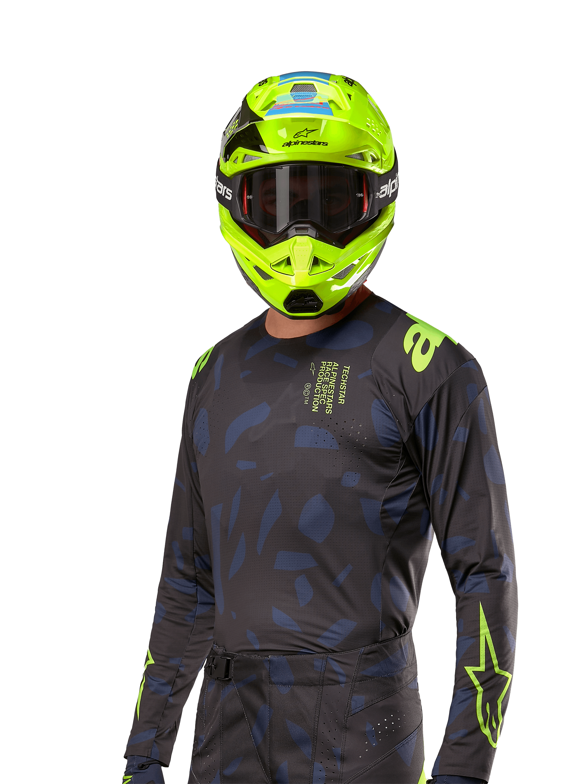 Alpinestars 2024 Techstar Rantera Jersey, motocross racing jersey, black and navy with abstract patterns and neon yellow accents, worn with matching neon yellow helmet, performance fit design for off-road riding