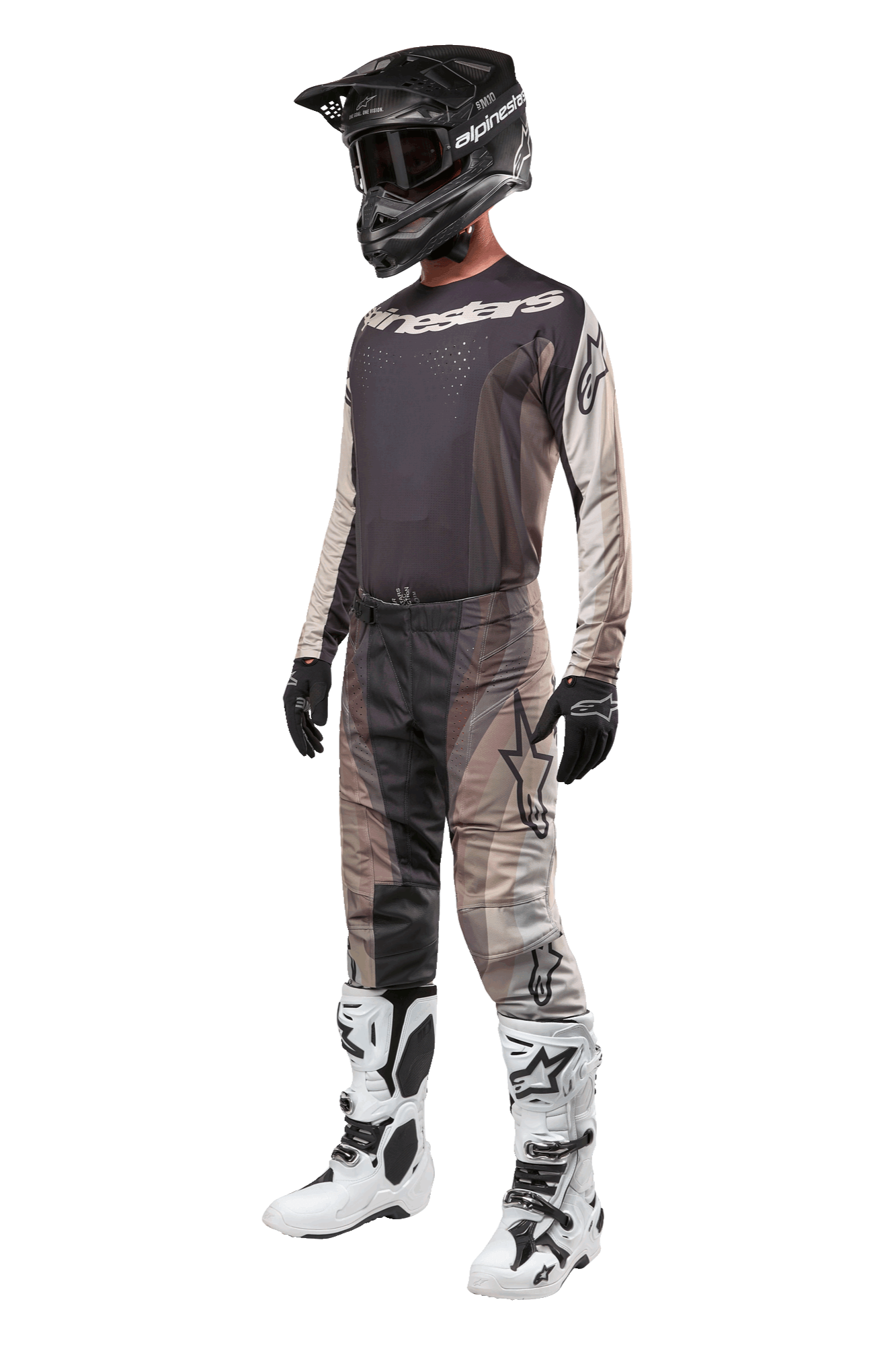 Motocross rider wearing complete racing gear, 2024 Techstar Pneuma Jersey in Dark Sand and Iron Dust Gray, matching patterned motocross pants, black helmet with goggles, white and black boots, black gloves, coordinated outfit for off-road racing