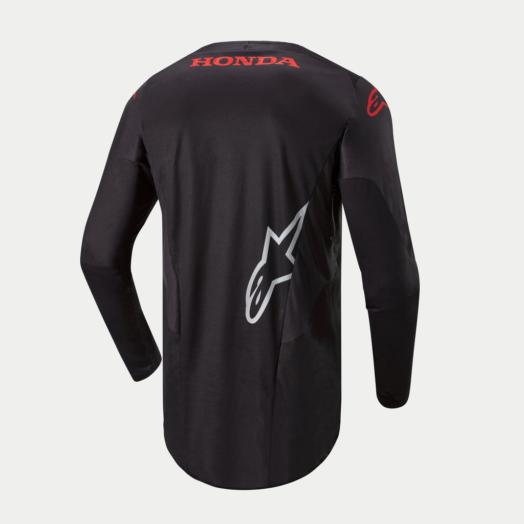 Alpinestars Honda Racer Iconic Trikot, Motocross-Herrentrikot in Schwarz mit roten und weißen Branding-Details, Langarm-Rennpassform mit verlängertem Rückenteil, Rückansicht mit Honda-Logo und Alpinestars-Grafiken