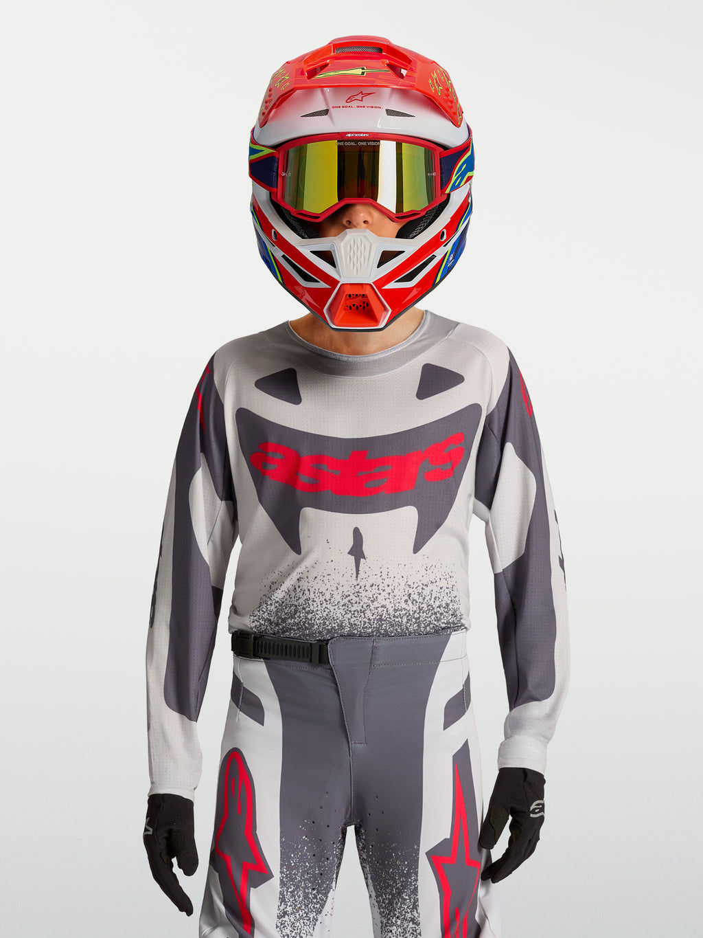 Alpinestars Supertech Swan Jugend-Trikot und Gear Set, grau-fluo-rote Motocross-Kombi aus atmungsaktivem Stretch-Mesh.