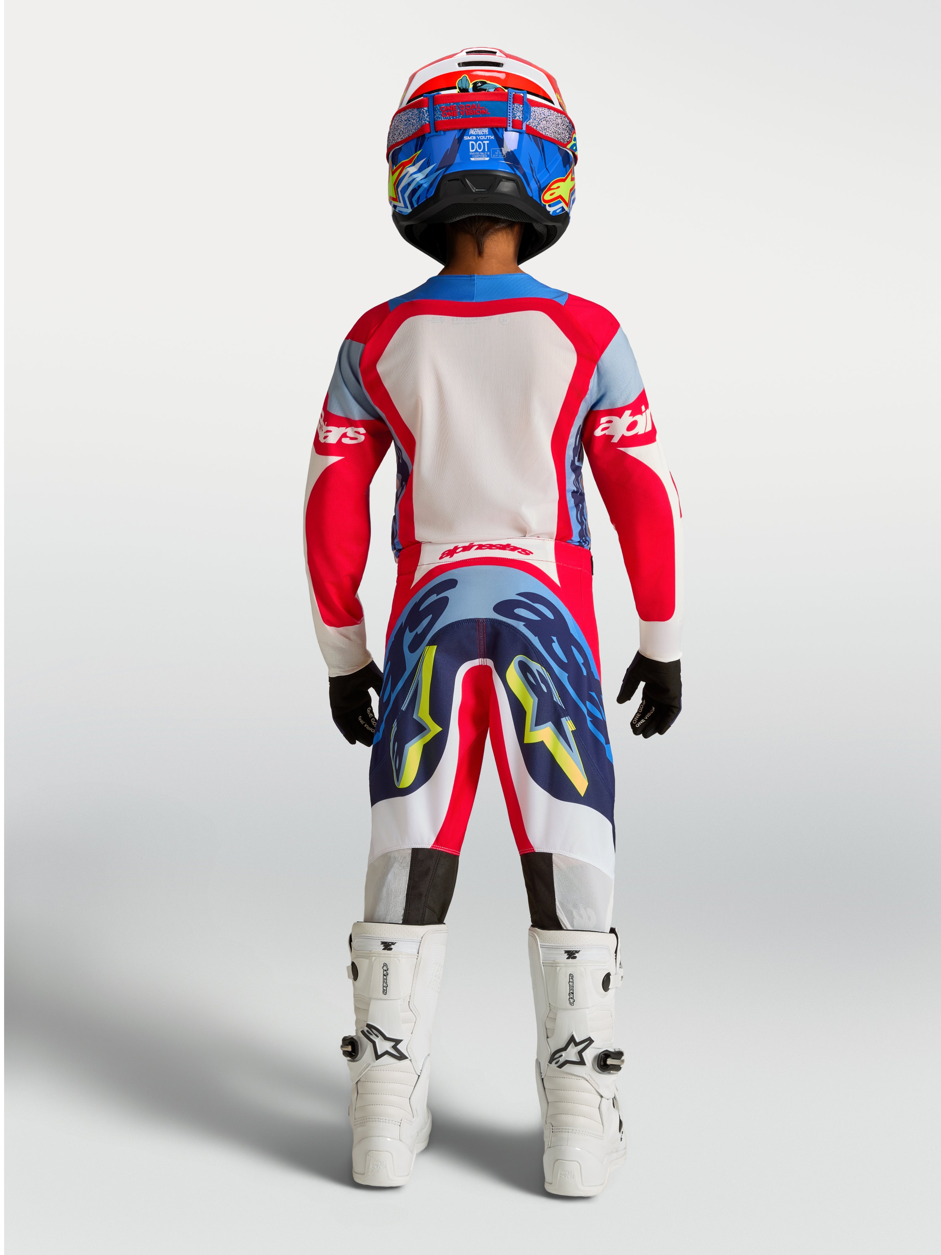 Alpinestars Supertech Dyna Jugend-Trikot und Gear-Set in Rot und Navyblau, Motocross-Rennausrüstung, Rückansicht.