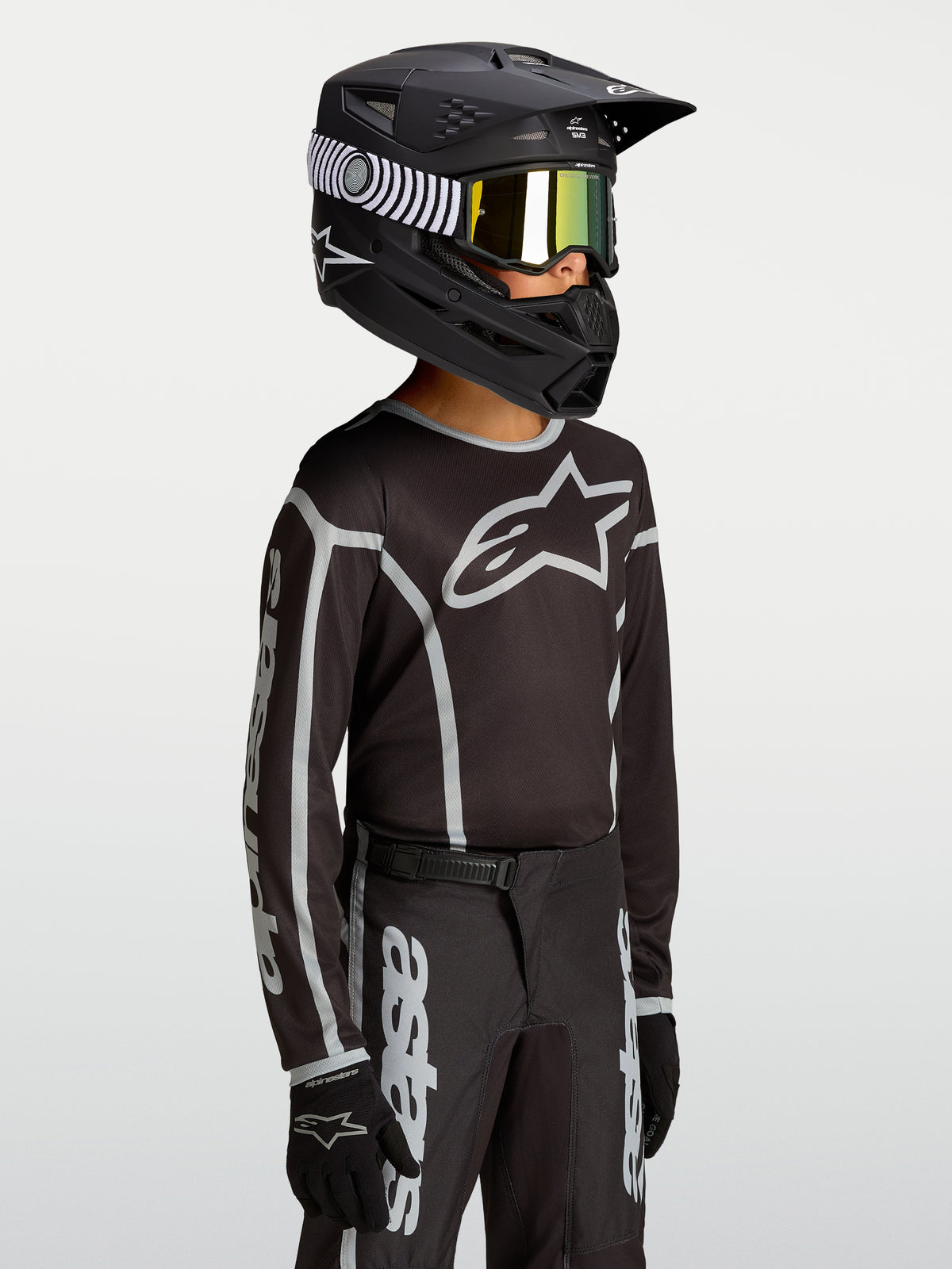 Alpinestars Youth Fluid Apex V2 Jersey, Motocross racing, Youth, Black and Silver, moisture-wicking textile with logo.