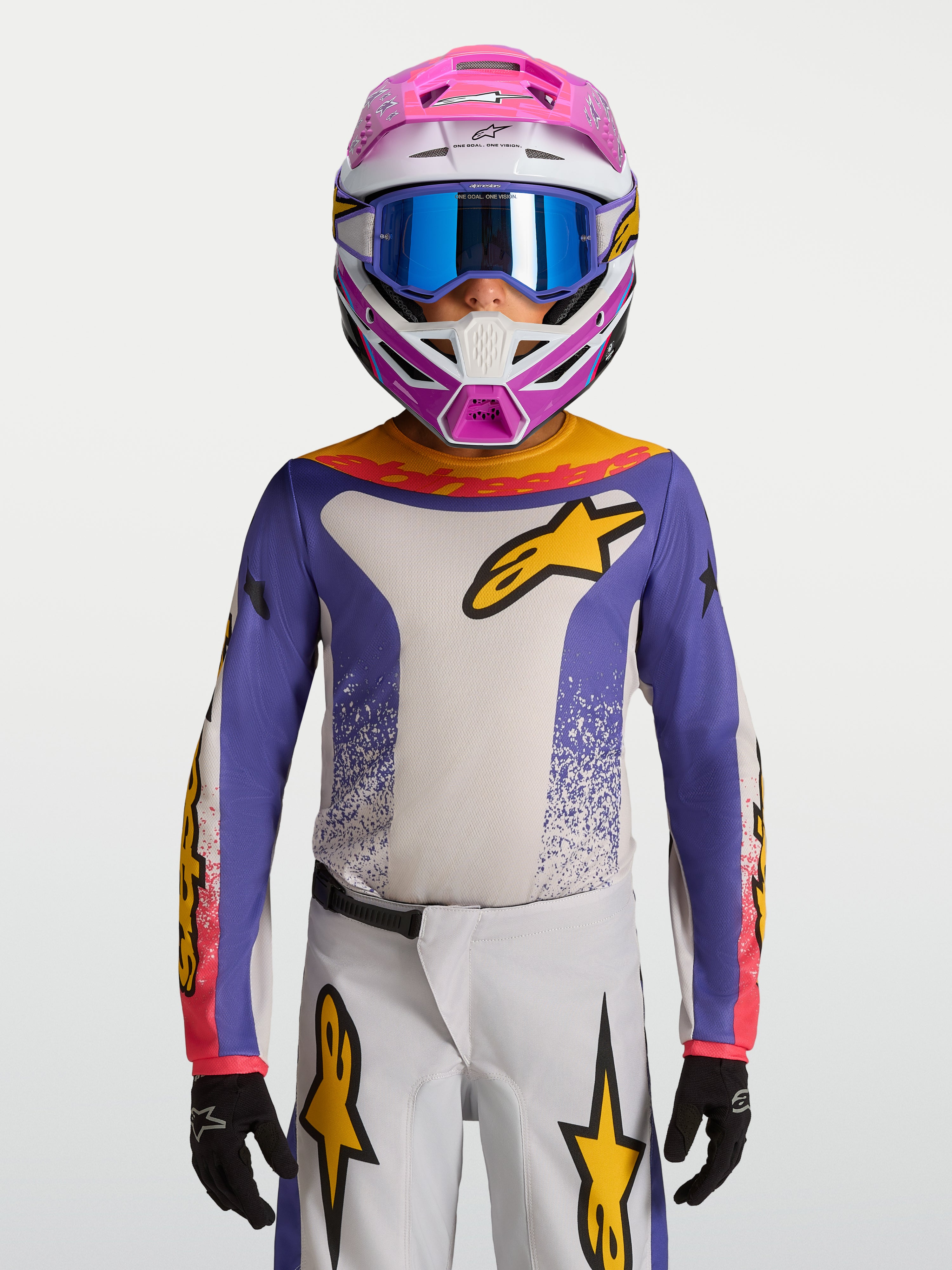 Alpinestars Fluid Jugend-Trikot Drag 2027, Motocross-Trikot in Blau und Weiß mit Gold, am Model für den Offroad-Einsatz.