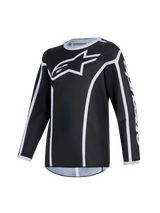 Alpinestars 2026 Youth Fluid Apex Jersey, Motocross Jersey, Black and Gray, featuring a large white A-star logo on the chest, white piping accents, and a sport collar, long-sleeve performance gear for youth off-road riding