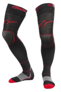 Alpinestars MX Long Tech Dicke Socken, Motocross-Fahrsocken, Schwarz und Rot, Oberschenkellänge mit rotem Branding, graue und rote Sohlendetails, technisches Gewebe für Offroad-Rennsport und Dirt-Bike-Stiefel