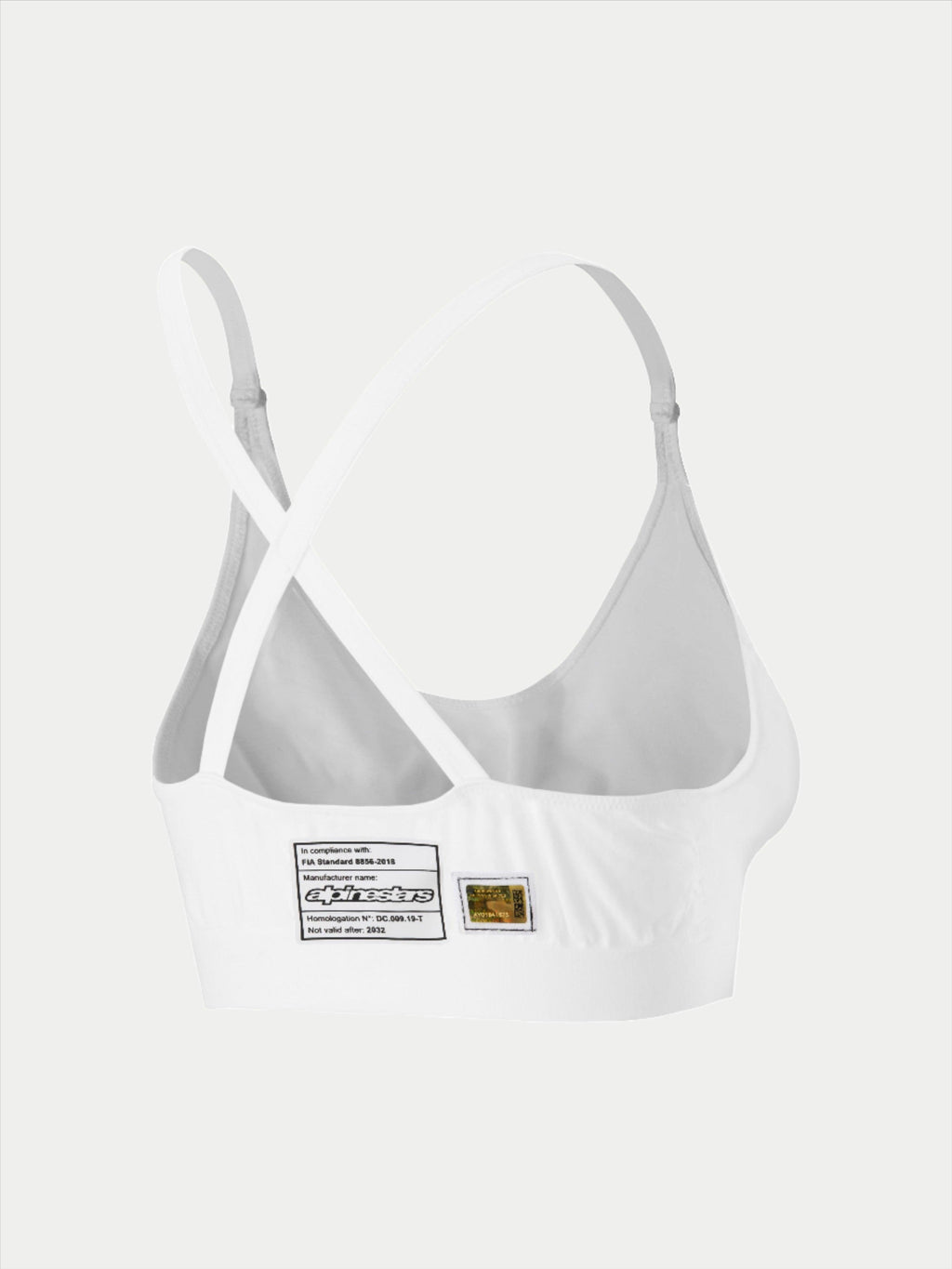 Alpinestars Stella TECH ZX Bra, weiße flammhemmende Rennunterwäsche, Rückansicht mit Cross-Back-Trägerdesign, zeigt FIA 8856-2018 Homologationslabel und Hologramm, leichte Performance-Basisschicht für Damen