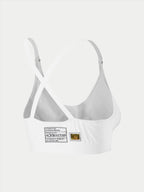 Alpinestars Stella TECH ZX Bra, weiße flammhemmende Rennunterwäsche, Rückansicht mit Cross-Back-Trägerdesign, zeigt FIA 8856-2018 Homologationslabel und Hologramm, leichte Performance-Basisschicht für Damen