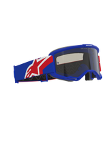 Alpinestars Vision Sand Goggles, off-road motocross eyewear, Blue Red and White frame and strap, Dark Smoke tinted lens, featuring a wide silicone-backed strap and ergonomic face foam.
