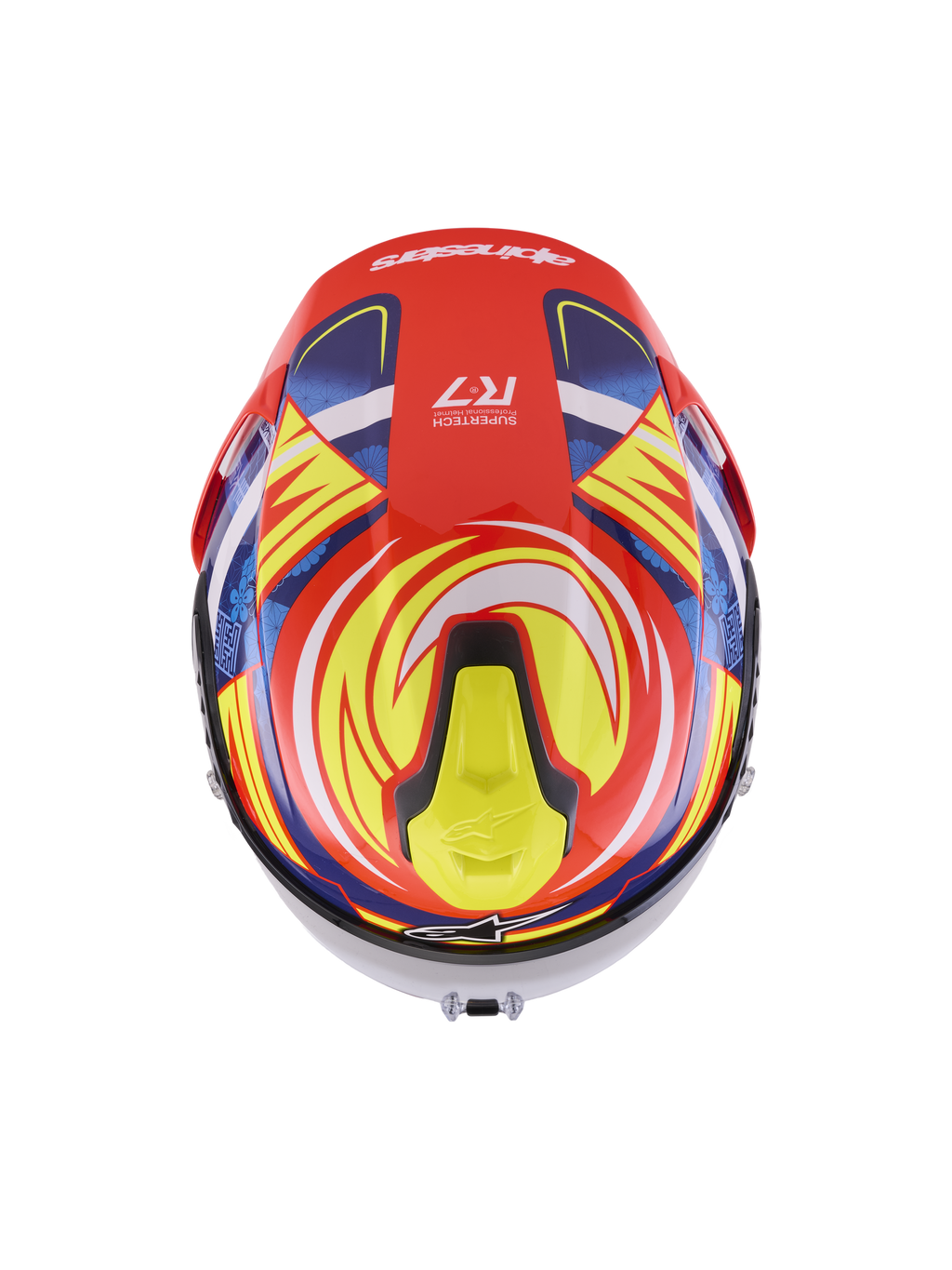 Alpinestars S-R7 Taiyo Furusato Helm ECE 06, Integral-Motorradrennhelm, Rot, Weiß, Blau und Gelb, glänzende Carbon-Konstruktion, Ansicht von oben mit aerodynamischem Spoiler und Belüftungsöffnungen