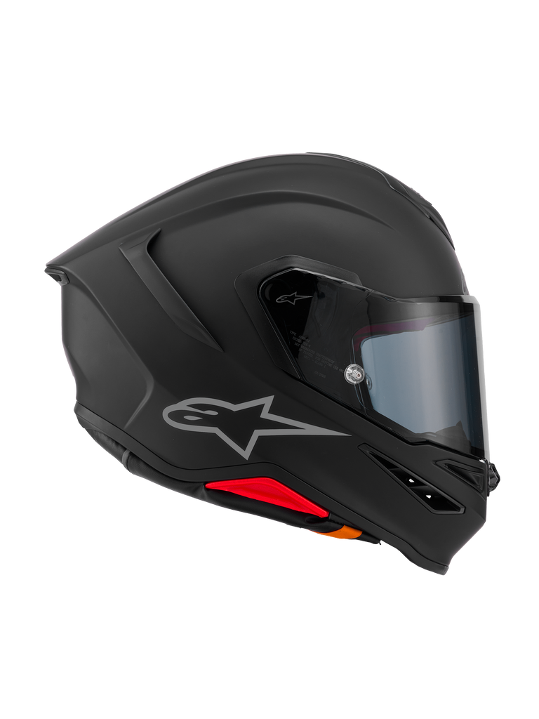 Alpinestars S-R7 Solid Helm, Motorrad-Integralhelm, Mattschwarz, Seitenprofilansicht mit aerodynamischer Carbon-Verbundschale, integriertem Heckspoiler, silbernem Astars-Logo, klarem Visier und Belüftungsöffnungen, Renn- und Sport-Fahrerausrüstung
