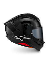 Alpinestars S-R7 Solid Helmet, Full-Face Motorcycle Helmet, Black Glossy, profile view featuring a white A-star logo, streamlined aerodynamic shell with integrated spoiler and red accents at the base, designed for racing and sport performance.
