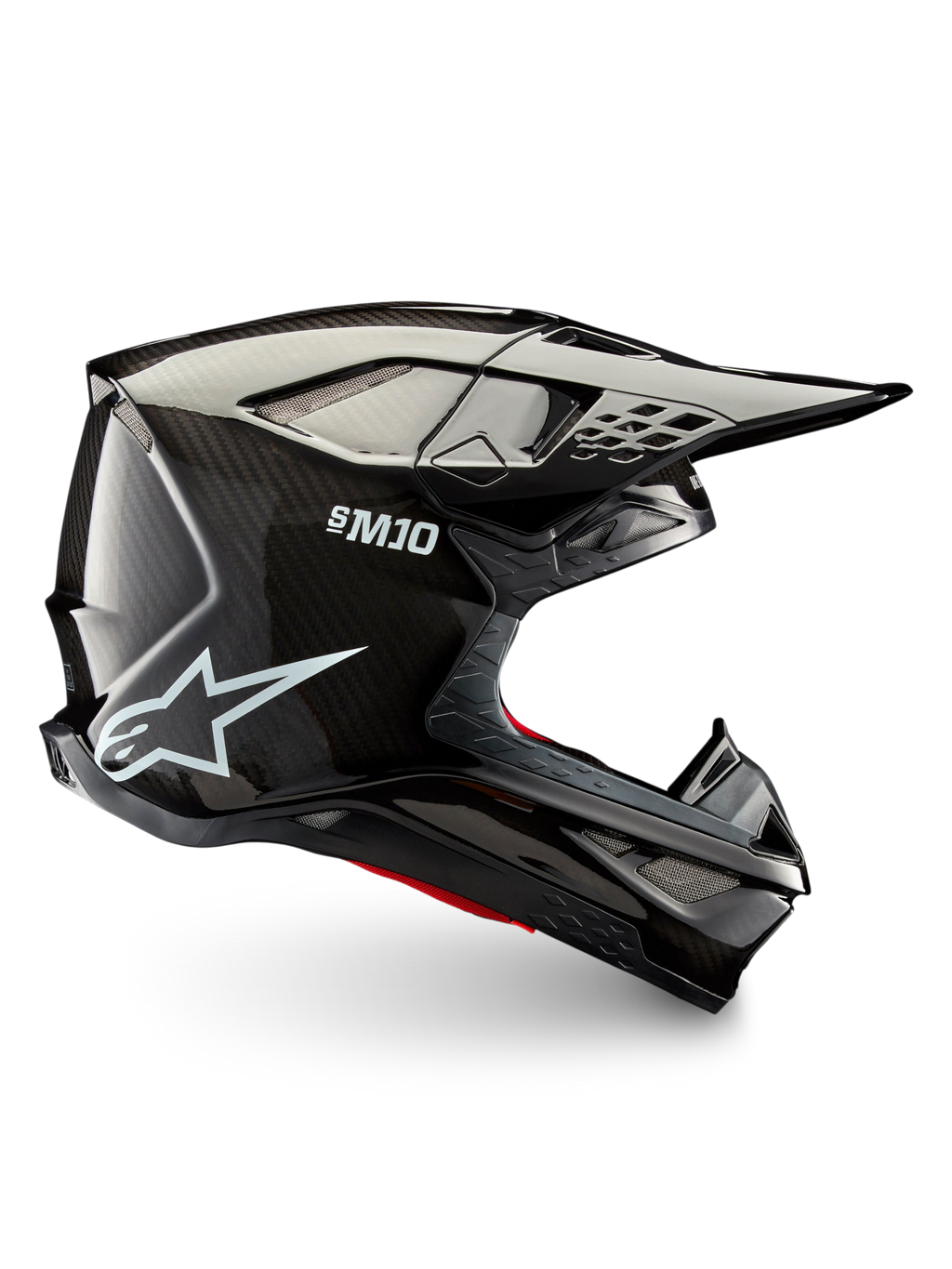 Alpinestars Supertech M10 Solid motocross helmet, side profile in black glossy carbon with carbon shell, peak visor and ventilation ports for off-road riding