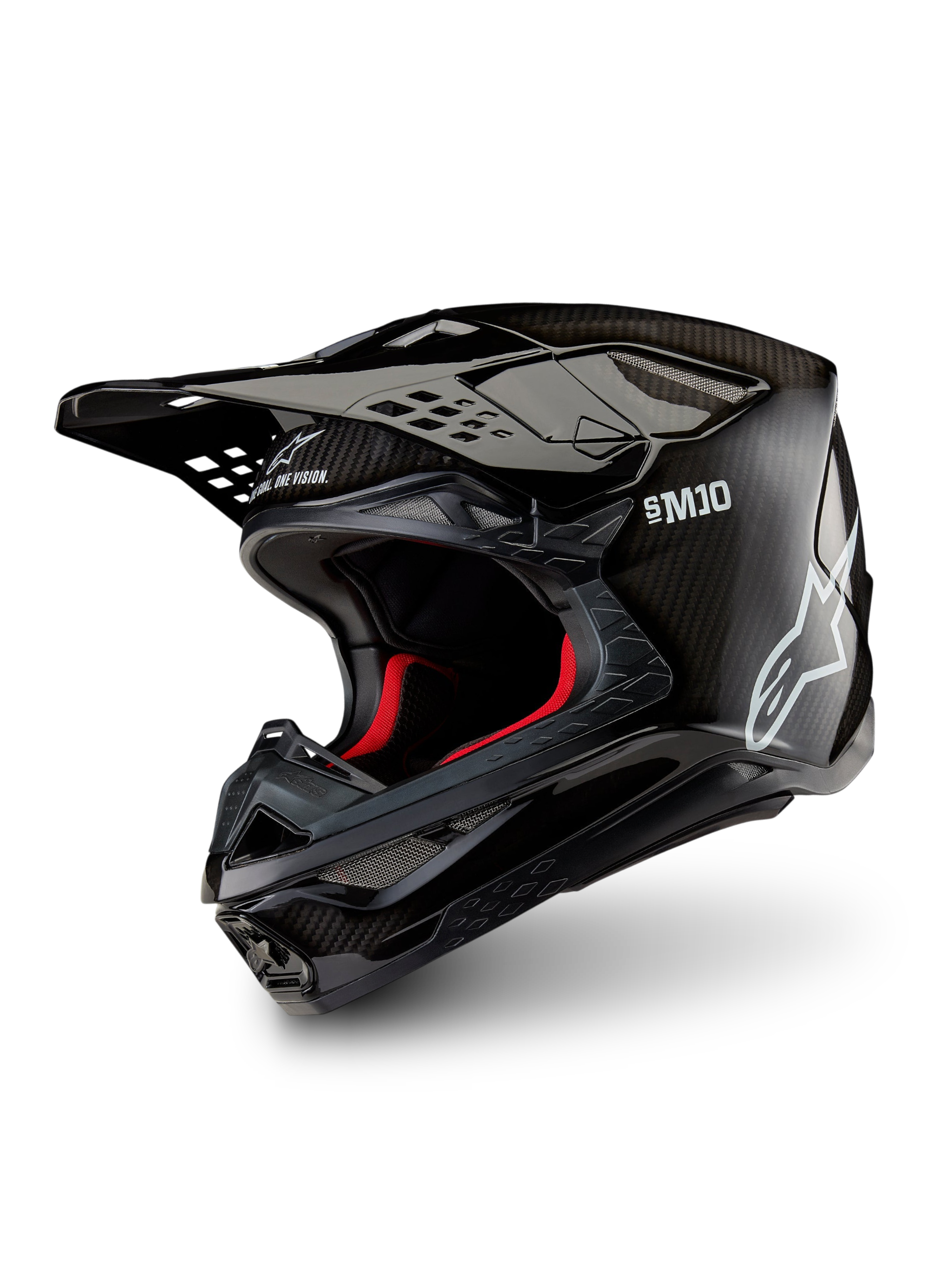 Alpinestars Supertech M10 Solid Helmet ECE 22.06, black glossy carbon motocross helmet with carbon-fiber shell, peak visor and red interior lining, three-quarter view.