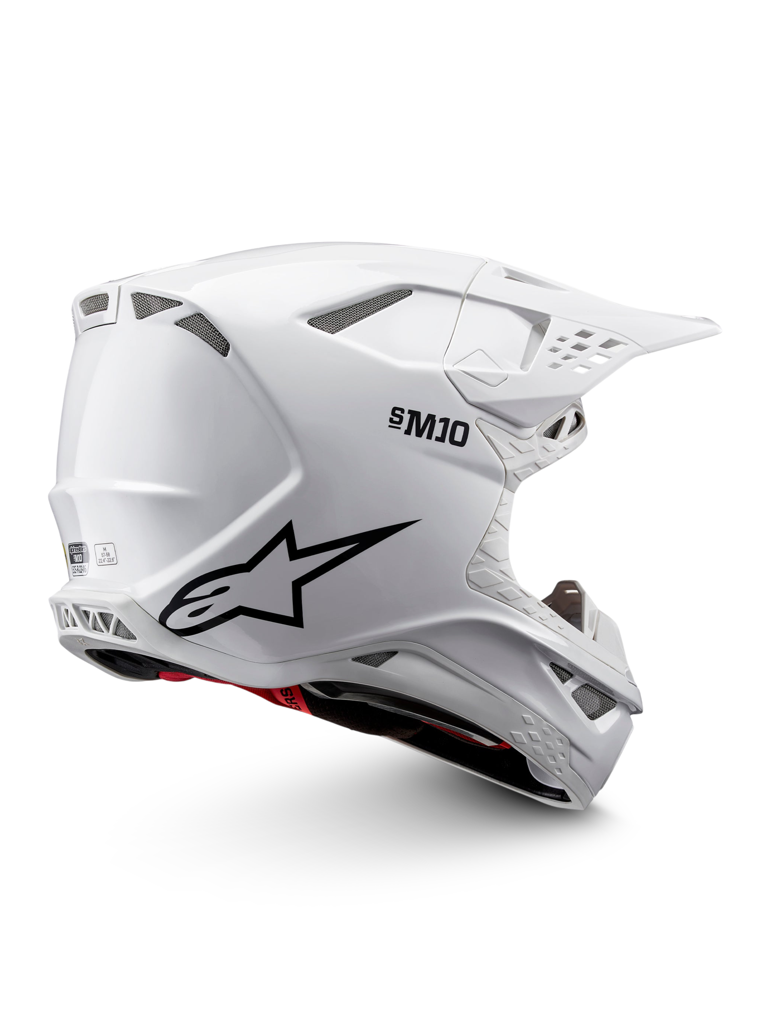 Alpinestars Supertech M10 Solid Helm ECE 22.06, weiß glänzender Motocross-Helm mit schwarzen Grafiken, roten Akzenten, Belüftungsöffnungen und Schirmvisier