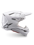 Alpinestars Supertech M10 Solid Helm ECE 22.06, weiß glänzender Motocross-Helm mit schwarzem Logo, Visier und belüftetem Vollvisierdesign, Seitenansicht