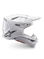 Alpinestars Supertech M10 Solid Helm ECE 22.06, weiß glänzender Motocross-Helm mit schwarzem Logo, Visier und belüftetem Vollvisierdesign, Seitenansicht